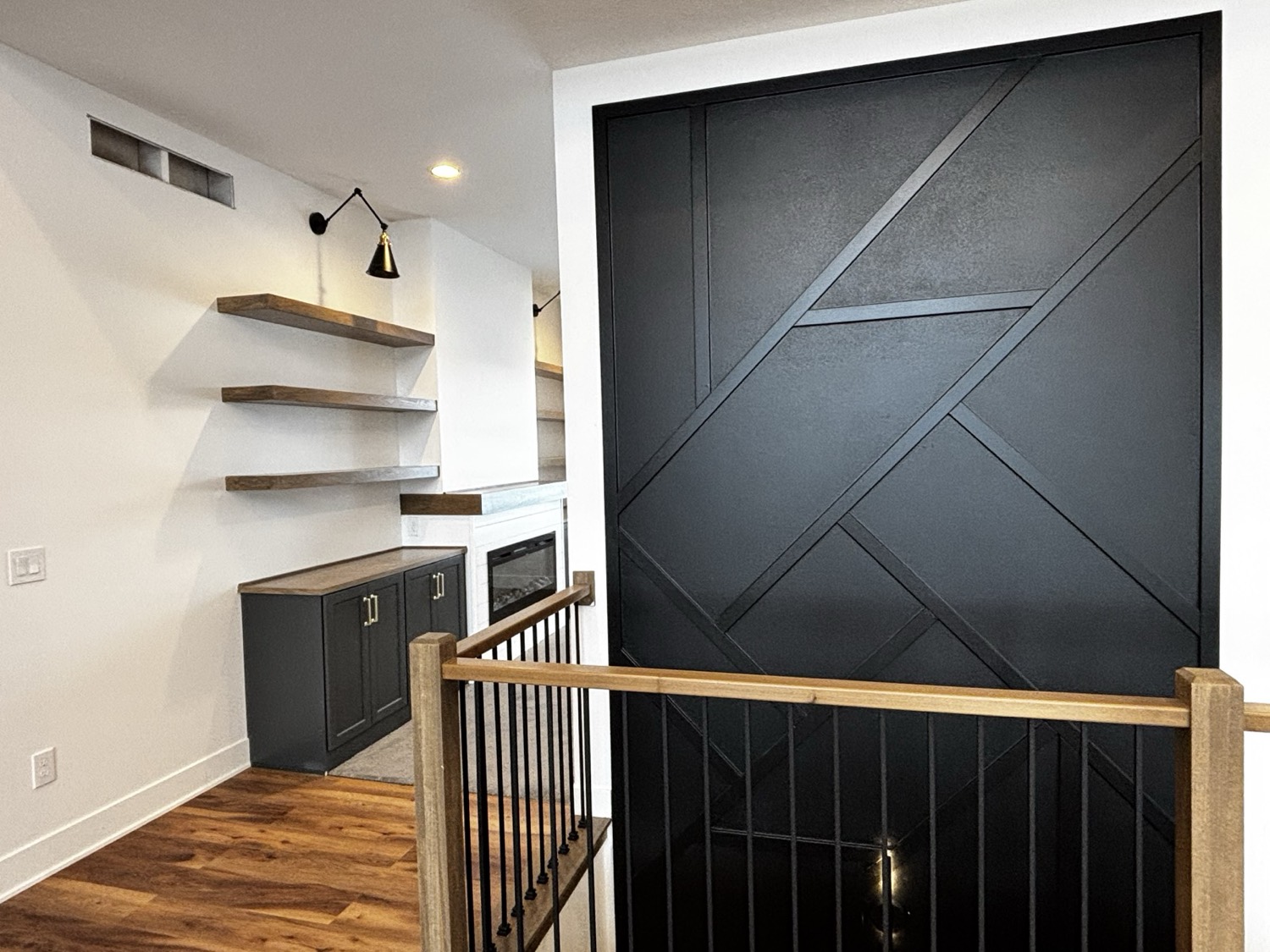 Custom millwork accent wall built on site by the finish carpentry crew